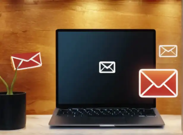 A busy inbox filled with emails being deleted by a happy person