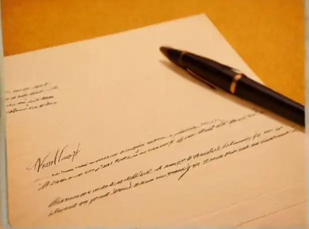 A handwritten letter on a warm background