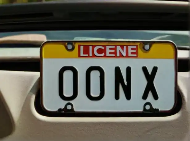 License plate and car dashboard with points registration