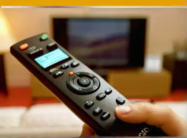 A person holding a remote control watching a TV with a nostalgic background