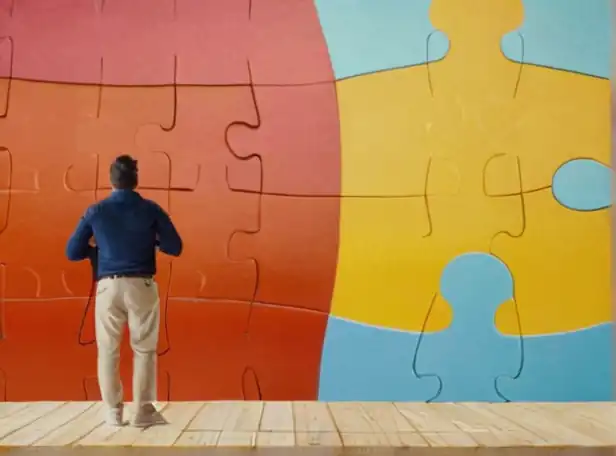 A person standing in front of a giant puzzle piece with a surprised expression