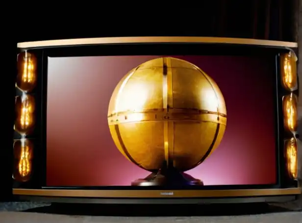 Golden Ball award on TV screen with satellite dishes