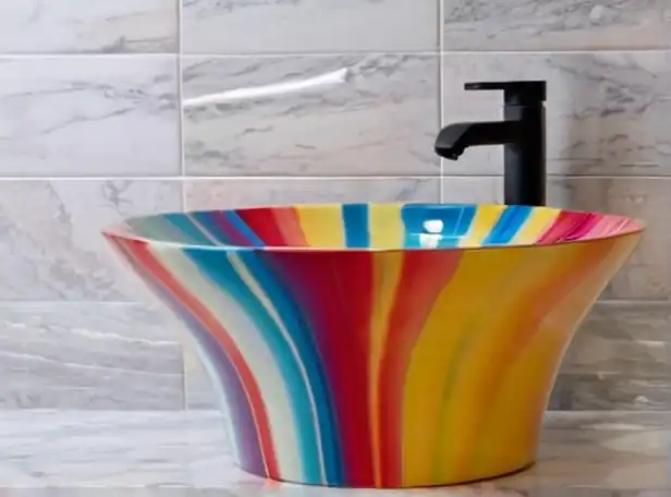 Vibrant hair swirled in a colorful washbasin