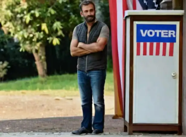 Voter standing outside polling booth with worried expression